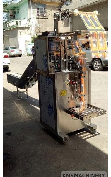 เครื่องบรรจุแนวตั้งแบบซีลกลางพร้อมสายพานลำเลียง รุ่น QJ-450BK
