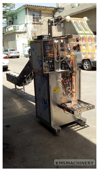 เครื่องบรรจุแนวตั้งแบบซีลกลางพร้อมสายพานลำเลียง รุ่น QJ-450BK